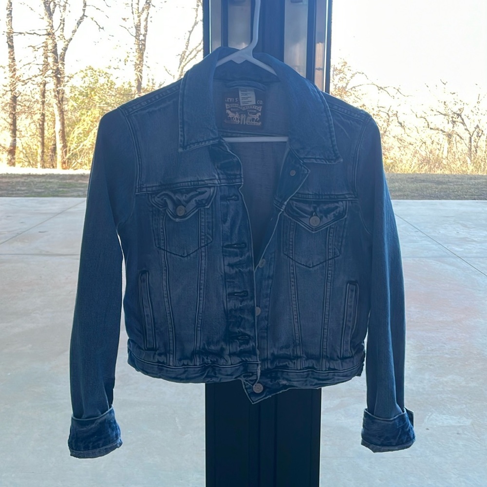 Levi Strauss brand. Fits like a small. Almost looks like brand new!